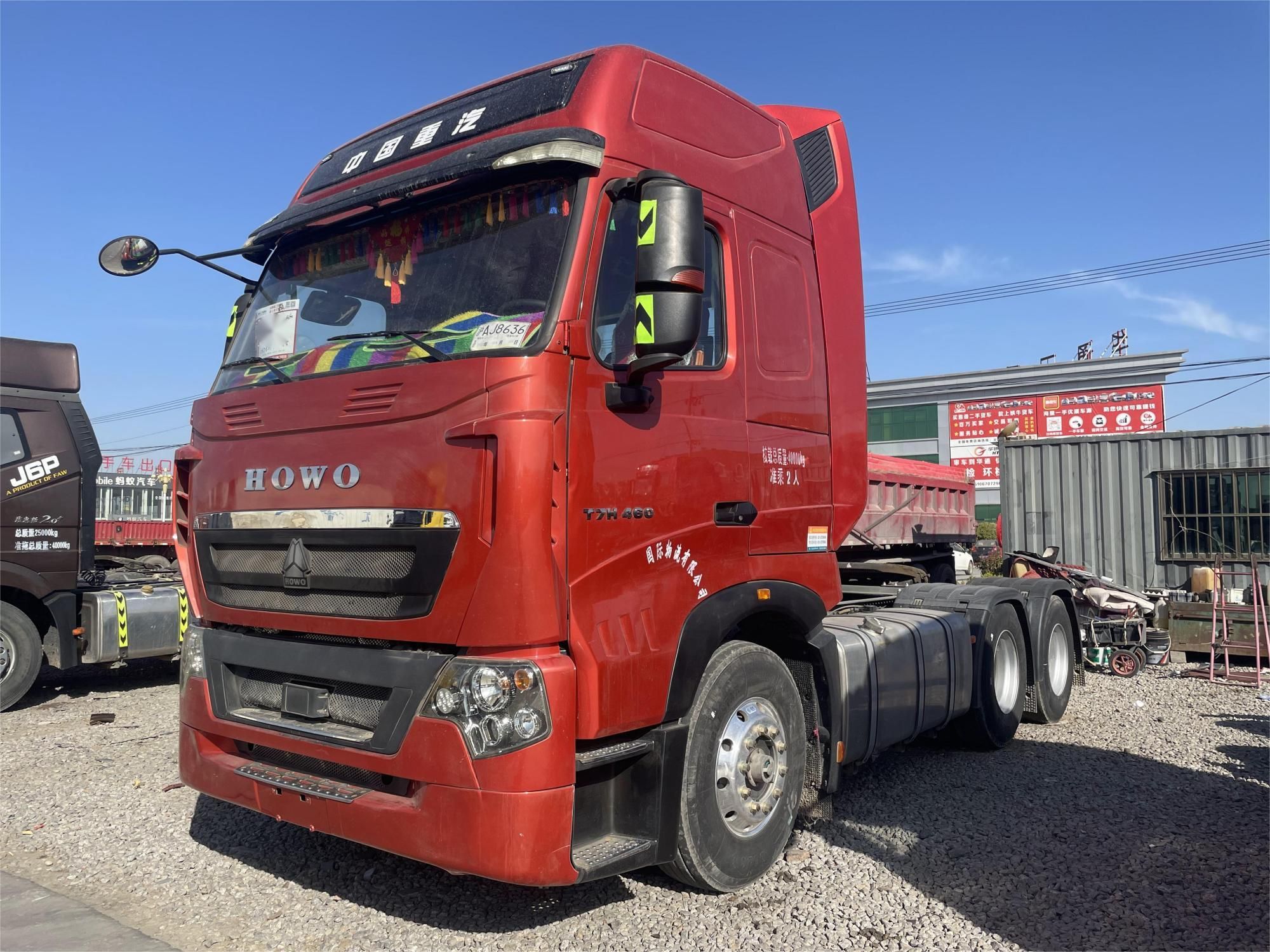 HOWO T7H 6×4 tractor — red front view
